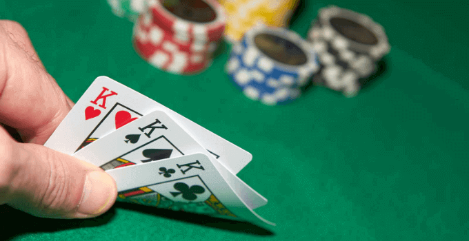 Three card poker online table games